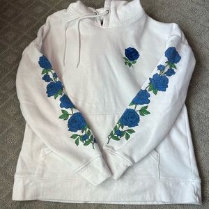 White hoodie with blue rose details